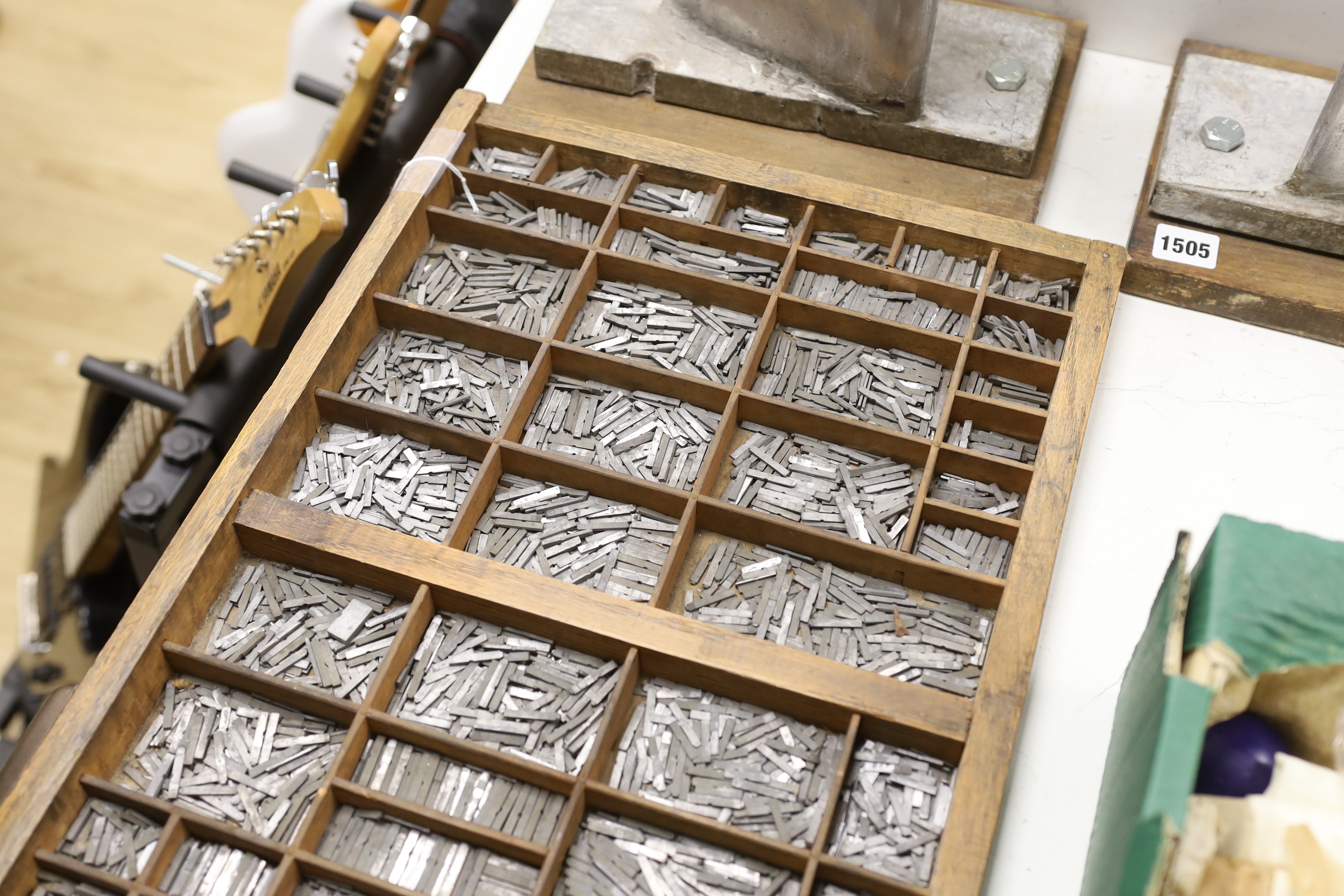 A wooden drawer with dividers as a printer's tray of type set, originally from The Argus building, Brighton, 82 x 36cm